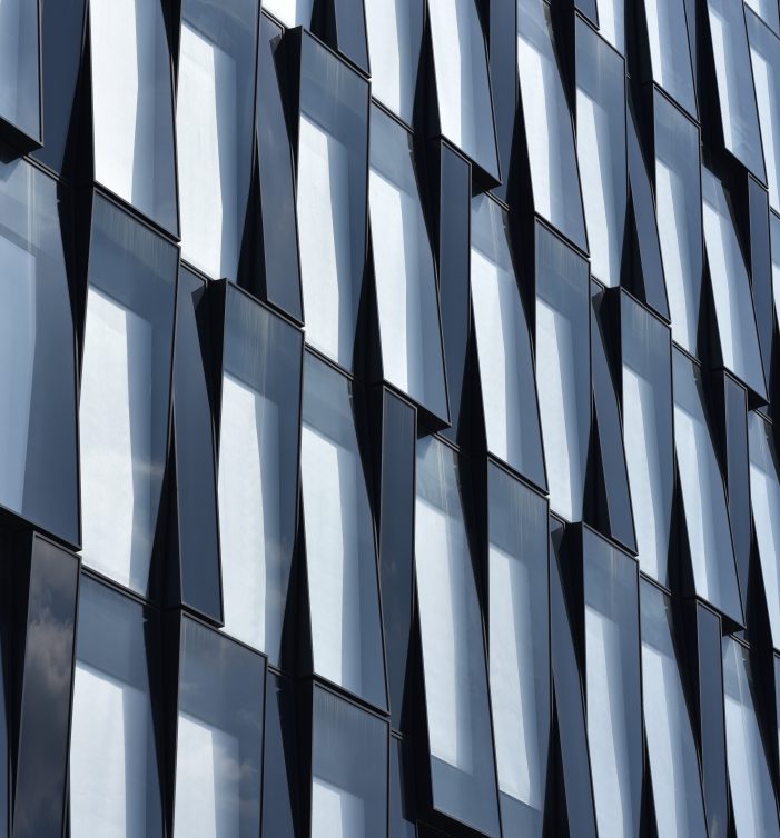 Glass,Facade,Of,Office,Building,With,Amazing,Modern,Architecture,Solution